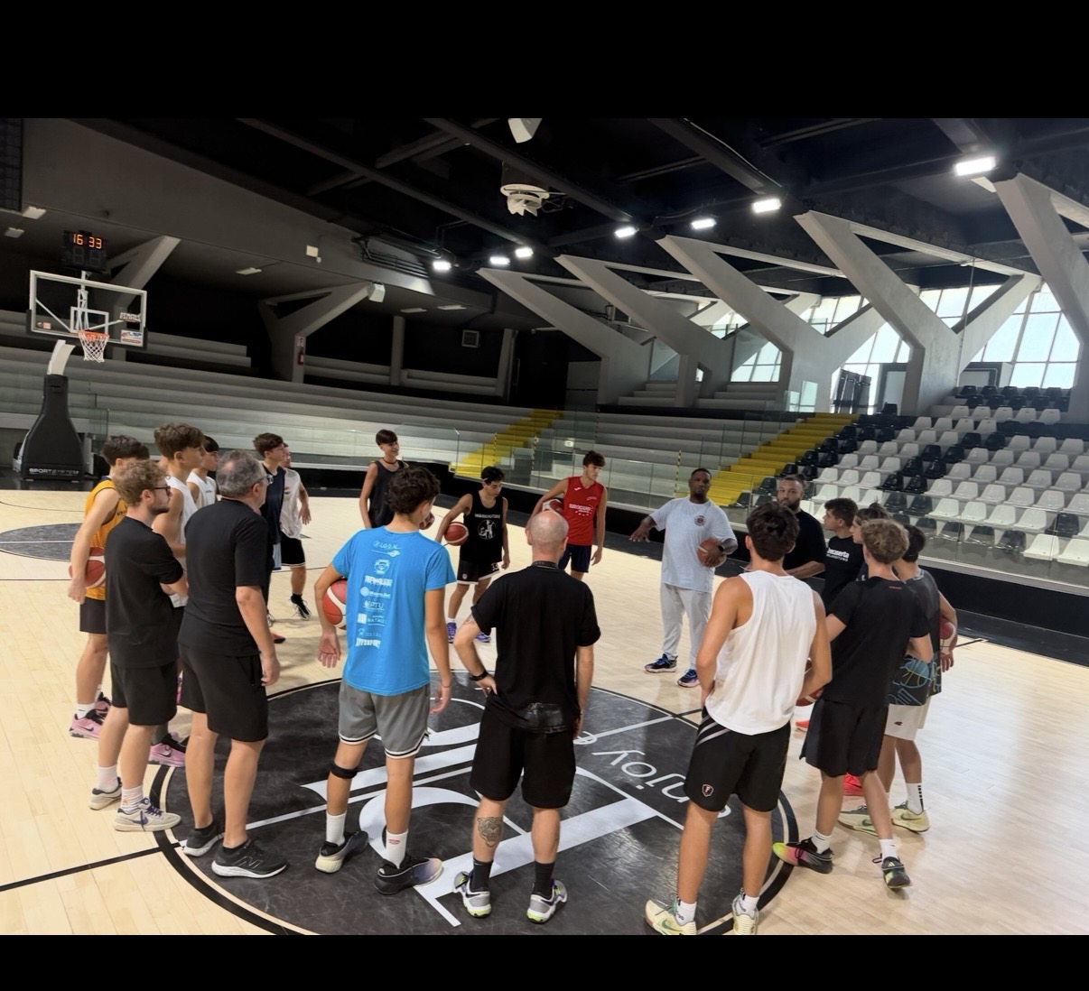 IBB coach instructing players during the Italy camp at Juve Caserta